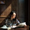 business woman reading in cafe