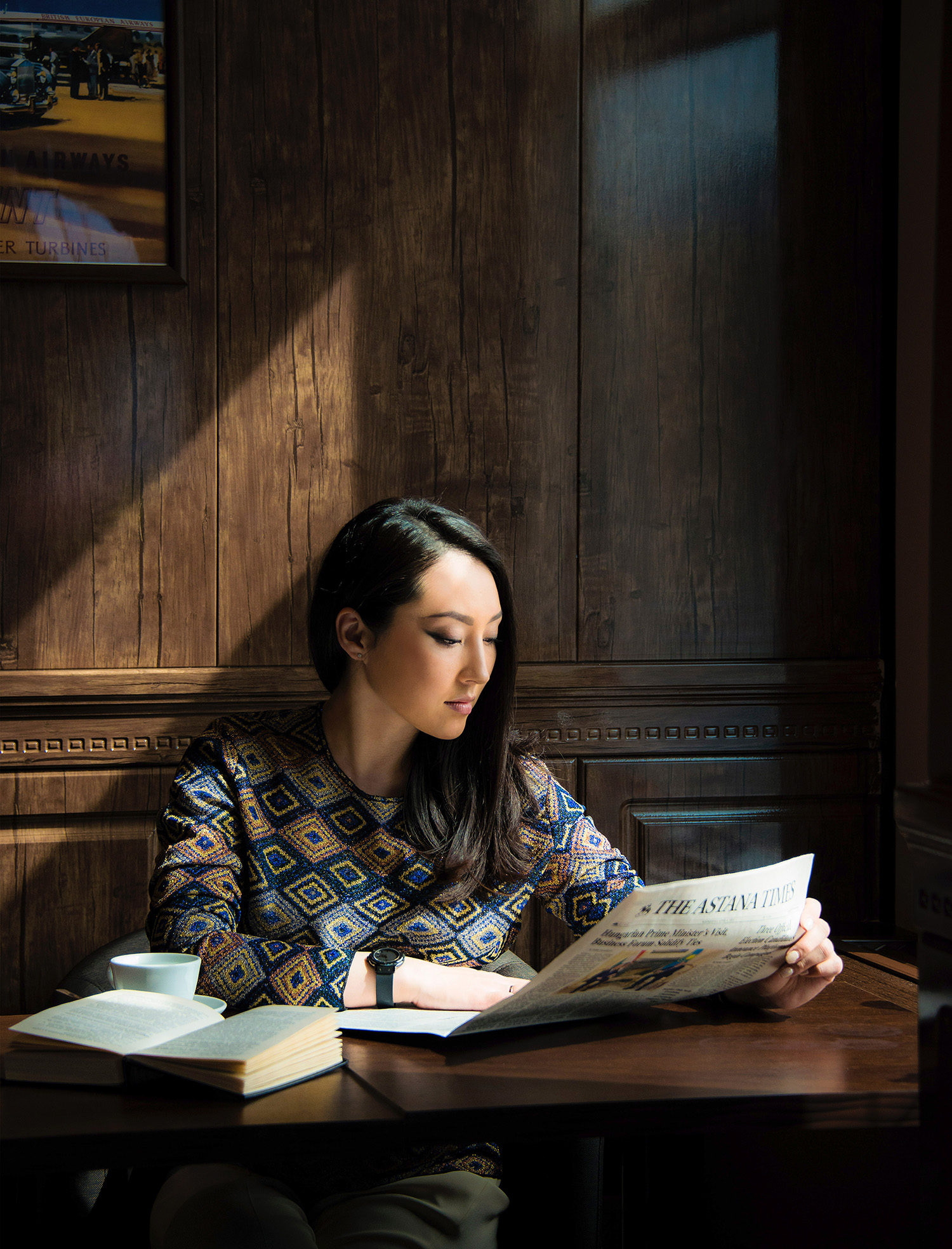 business woman reading in cafe